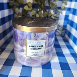 Bath and body works 3 wick candle.